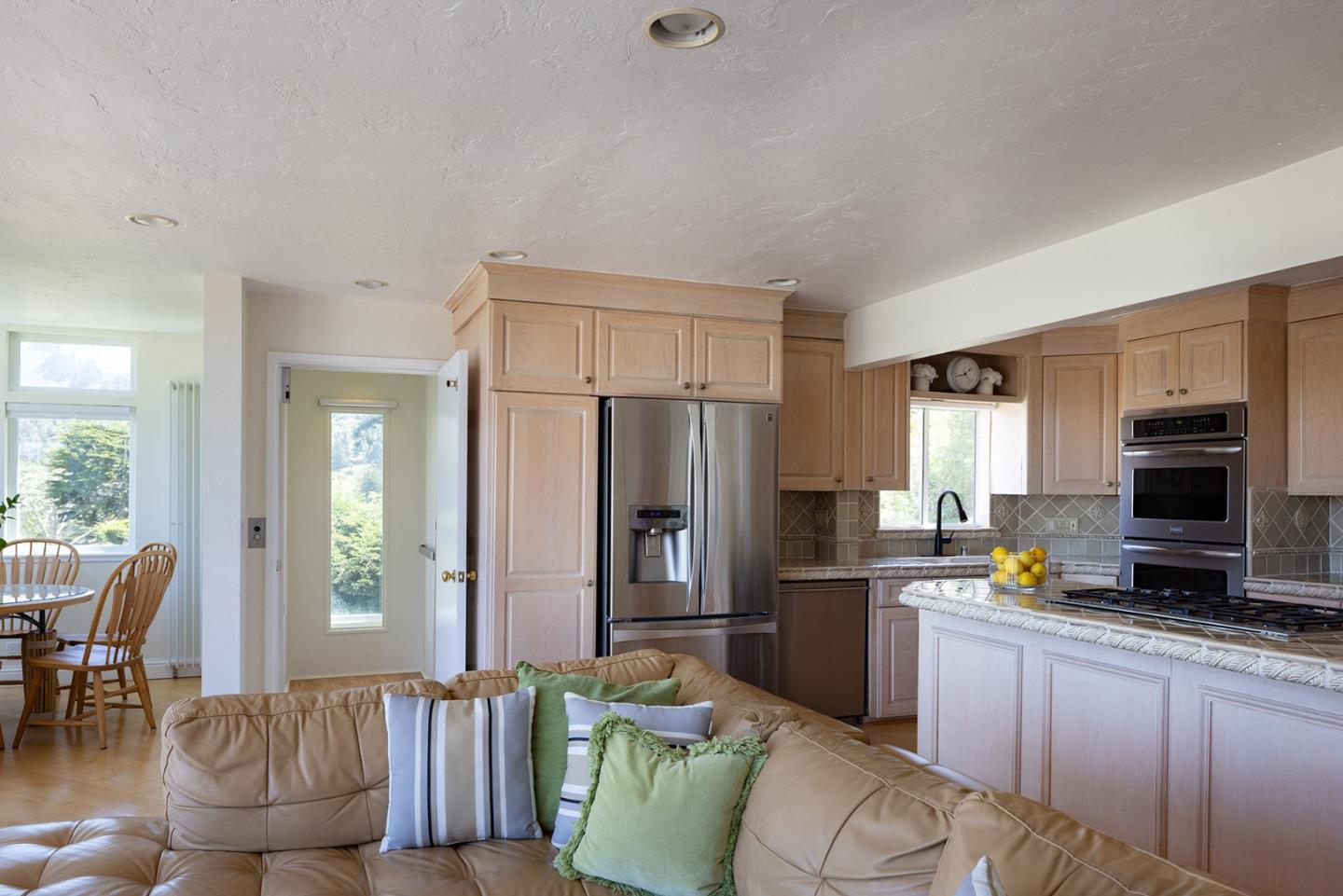 2920 Ribera Road Carmel, CA 93923 - Photo 8 of 18 a living room with furniture and a flat screen tv