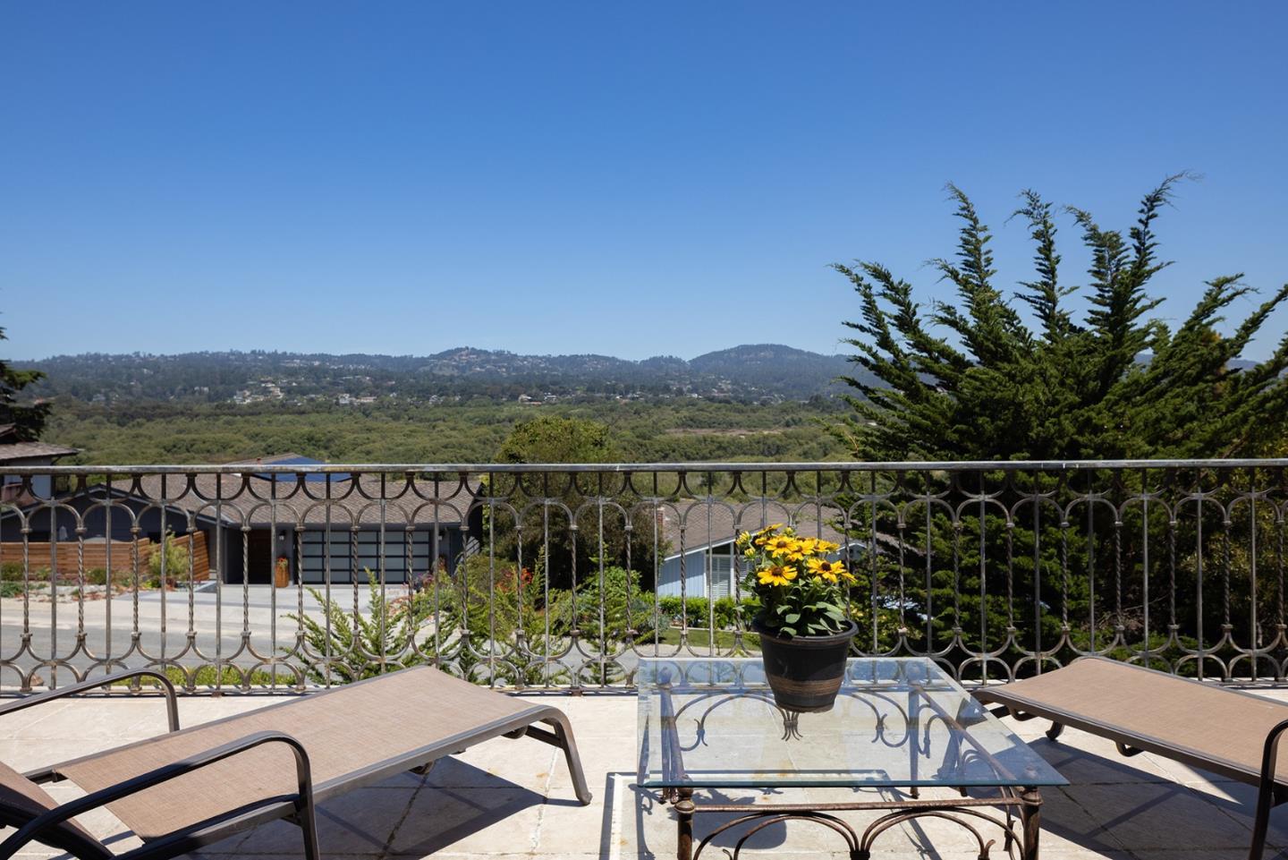 2920 Ribera Road Carmel, CA 93923 - Photo 10 of 18 a view of a chairs and table in patio