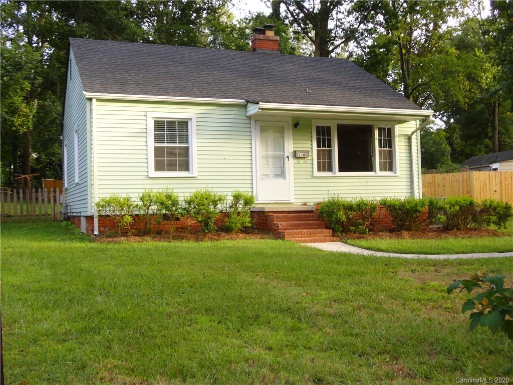 1900 Arnold Drive Charlotte, NC 28205 - Photo 1 of 23 a front view of a house with a yard and garden