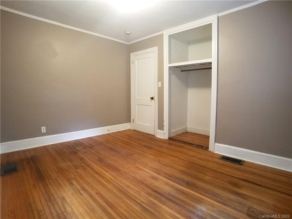 1900 Arnold Drive Charlotte, NC 28205 - Photo 17 of 23 a view of an empty room with wooden floor