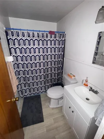 a bathroom with a sink and a toilet