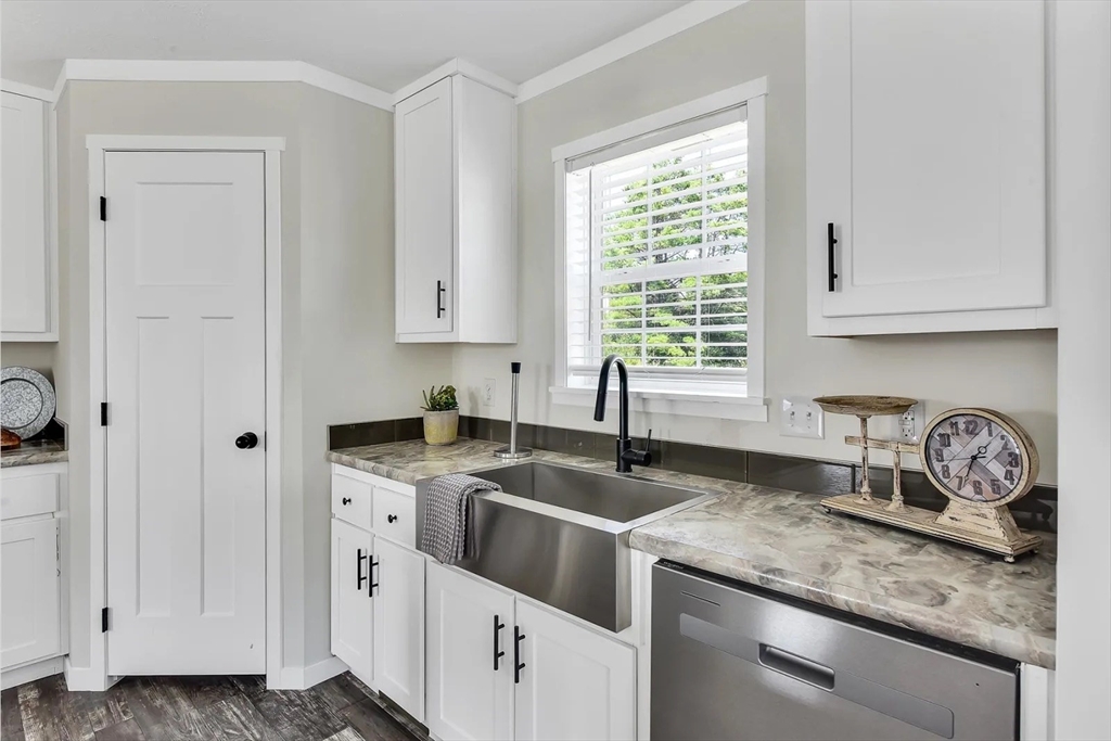 11 Annie's Way West Springfield, MA 01089 - Photo 17 of 18 a kitchen with granite countertop a sink stove and cabinets