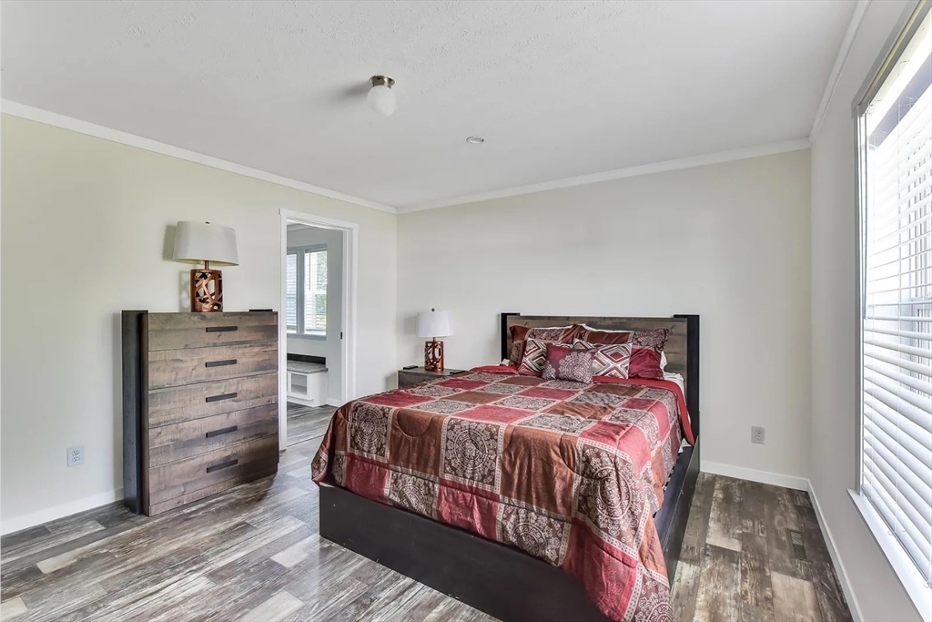 11 Annie's Way West Springfield, MA 01089 - Photo 8 of 18 a bedroom with a bed and a dresser