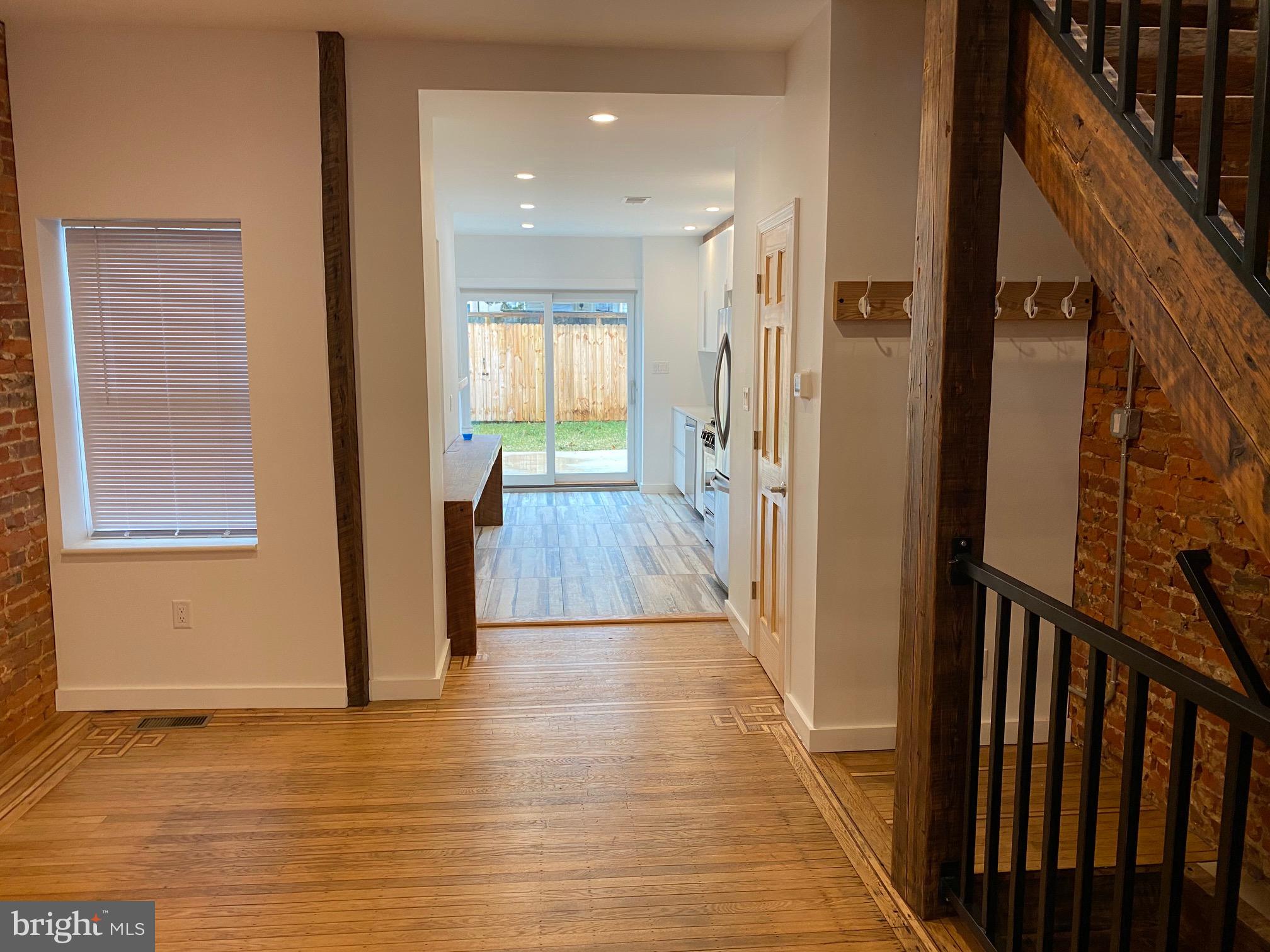 3229 Chatham Street Philadelphia, PA 19134 - Photo 11 of 41 a view of a hallway with wooden floor and staircase