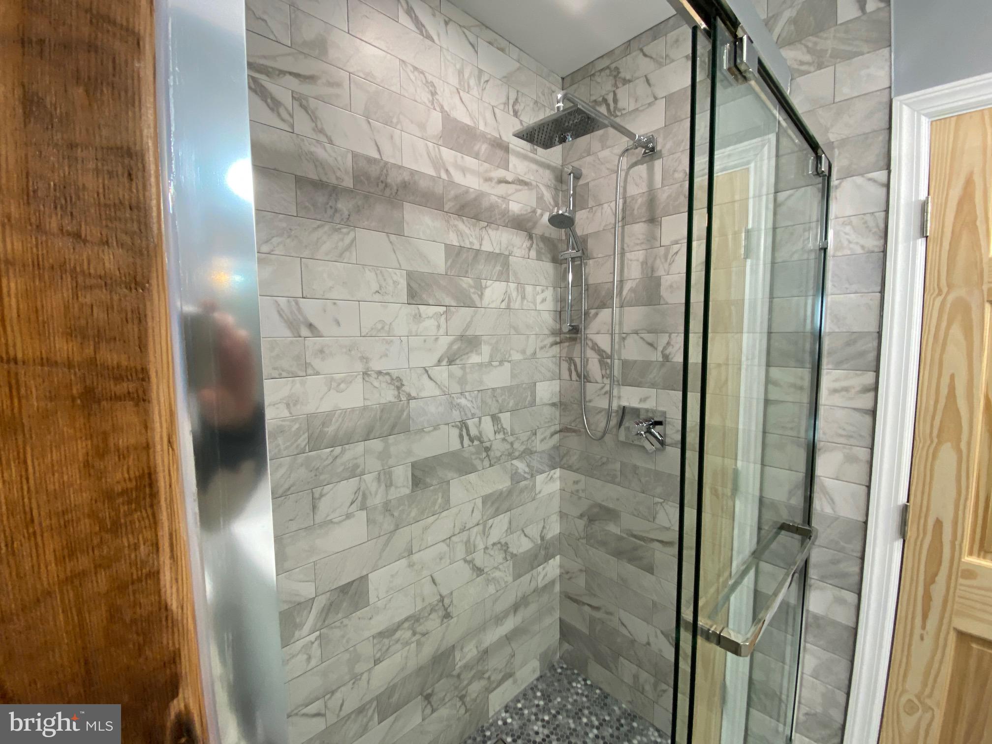 3229 Chatham Street Philadelphia, PA 19134 - Photo 36 of 41 a bathroom with a shower