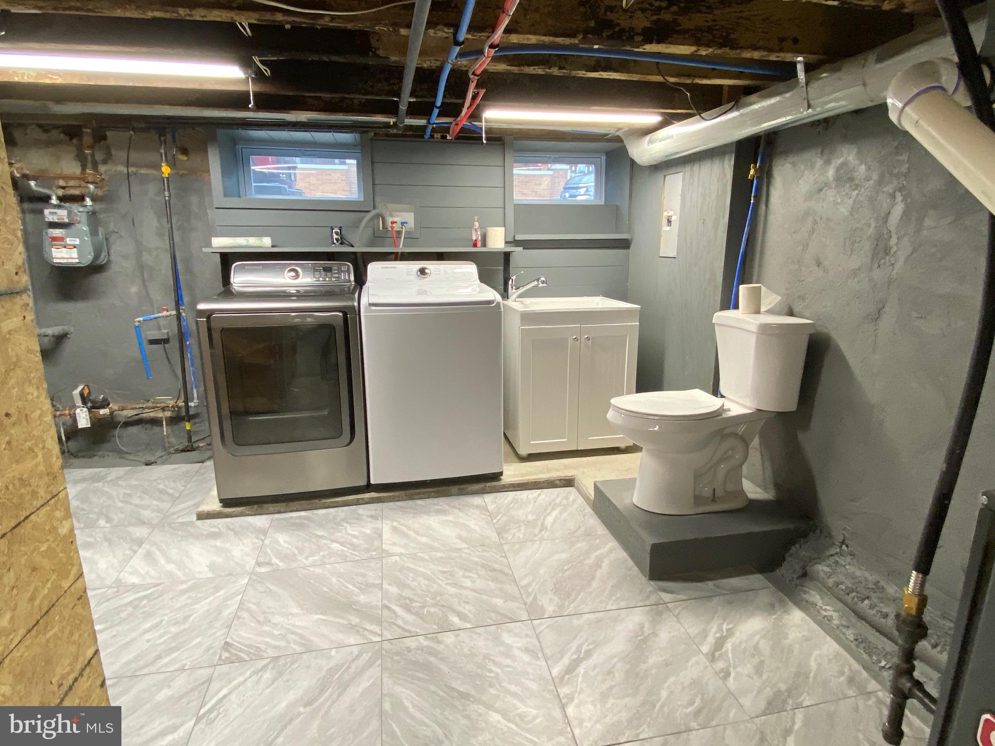 3229 Chatham Street Philadelphia, PA 19134 - Photo 40 of 41 a utility room with dryer and washer