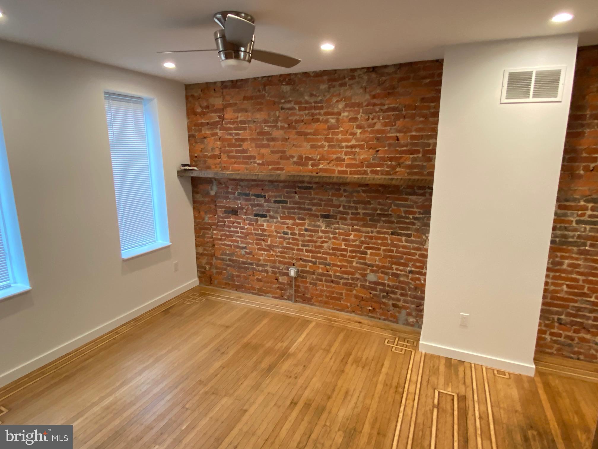3229 Chatham Street Philadelphia, PA 19134 - Photo 6 of 41 a view of an empty room with wooden floor