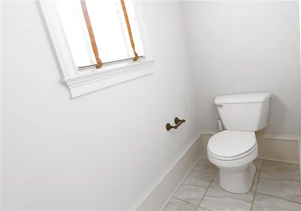 a bathroom with double vanity sink and a mirror