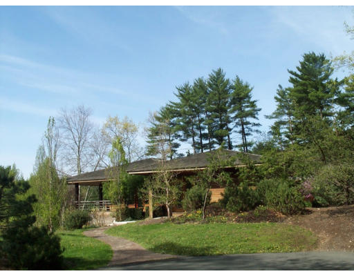27 Mill Run Road Boxford, MA 01921 - Photo 3 of 17 a view of a big yard next to a yard