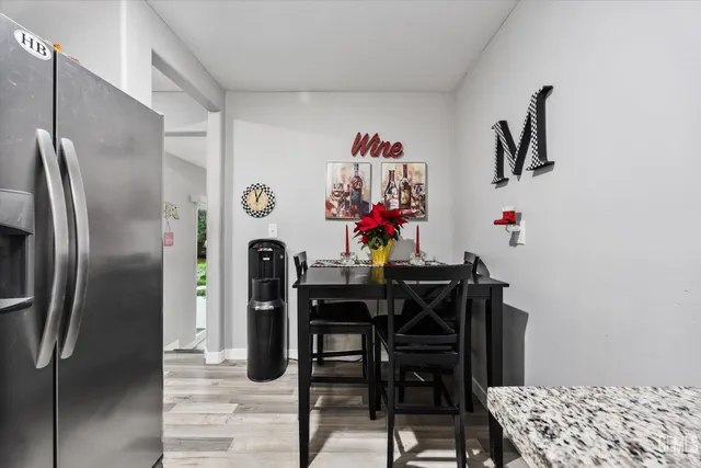 a view of a dining room with furniture
