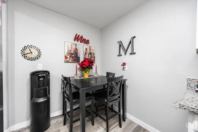 a view of a dining room with furniture