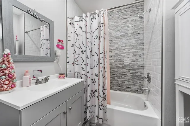 a bathroom with a sink and a bathtub