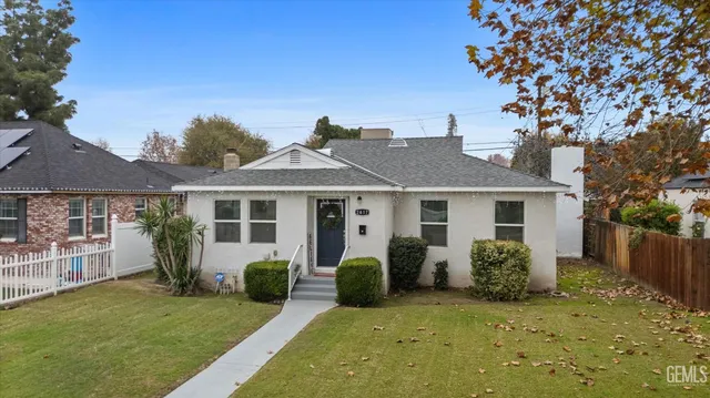 front view of a house with a yard