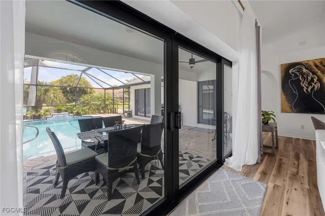 a view of a dining room with furniture window and outside view