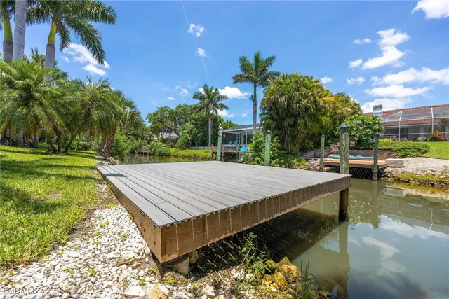 a view of a swimming pool with a patio
