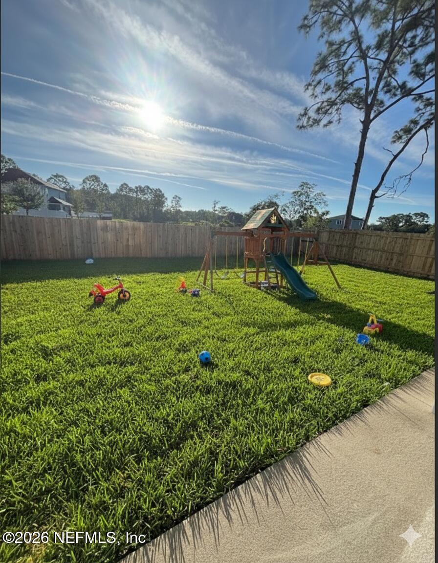 1301 Jewelstone Lane Jacksonville, FL 32221 - Photo 15 of 15 a view of a lush green space
