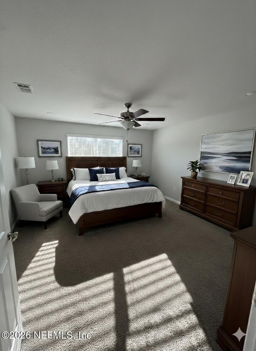 1301 Jewelstone Lane Jacksonville, FL 32221 - Photo 10 of 15 a bedroom with bed and window
