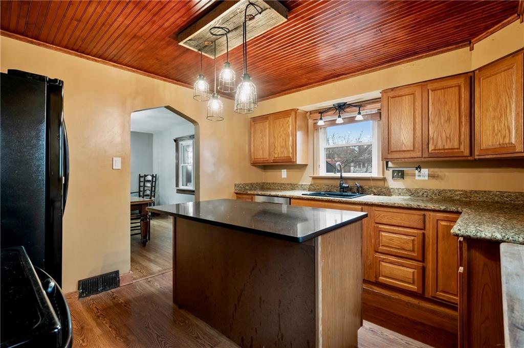 1327 Heberton Street Pittsburgh, PA 15206 - Photo 13 of 40 Easily add in barstools at the island for a eat-in kitchen space