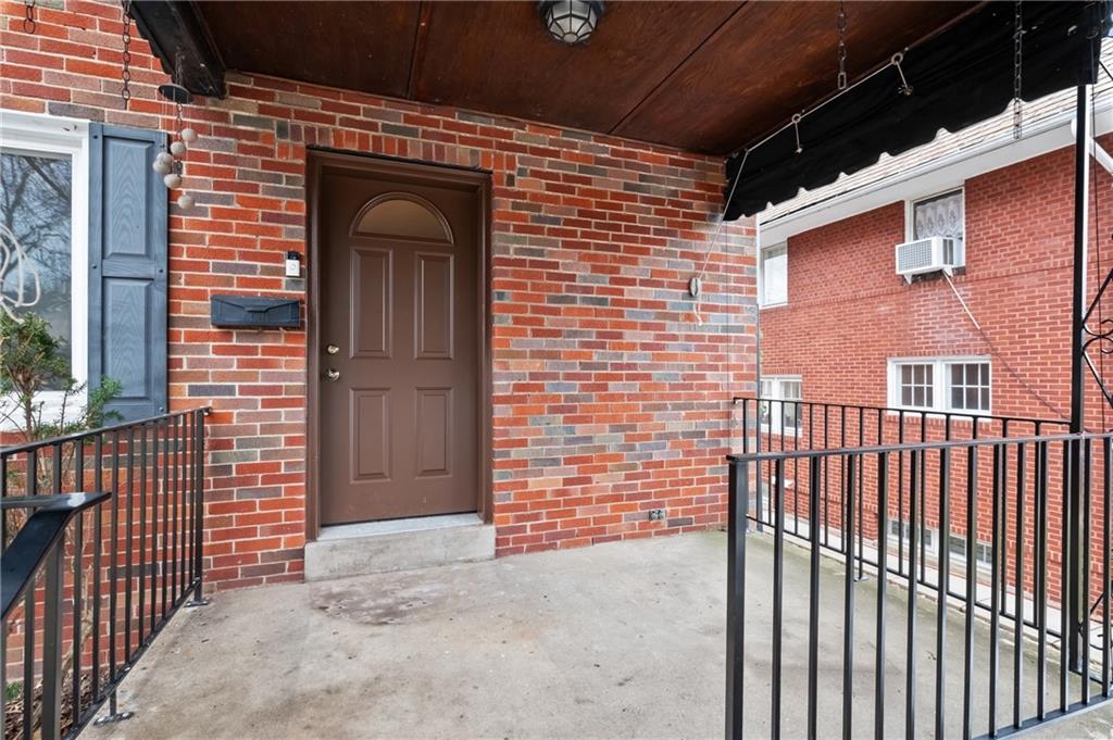 1327 Heberton Street Pittsburgh, PA 15206 - Photo 3 of 40 Cozy covered front porch with new door and railings