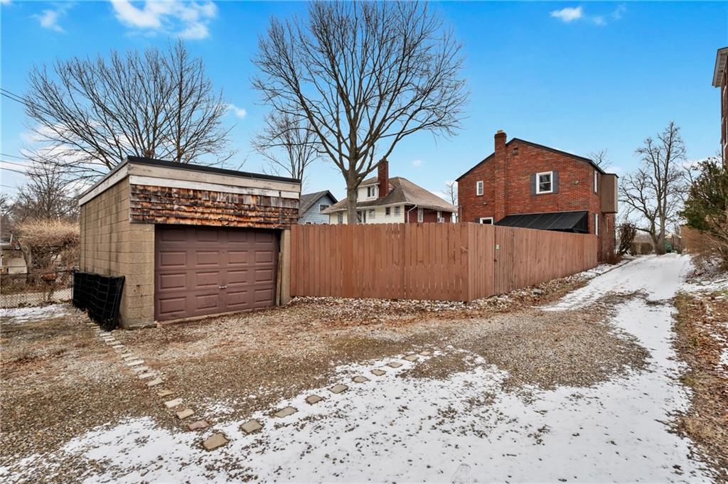1327 Heberton Street Pittsburgh, PA 15206 - Photo 36 of 40 Shared driveway leads to a detached garage and off-street parking space