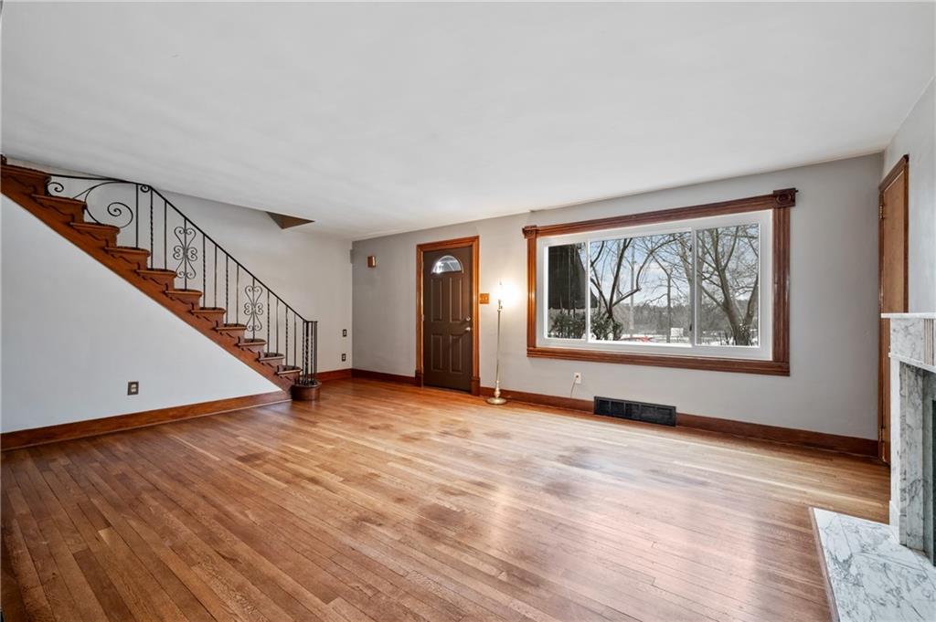 1327 Heberton Street Pittsburgh, PA 15206 - Photo 4 of 40 Rich hardwood floors and original woodwork create an immediate sense of warmth and craftsmanship