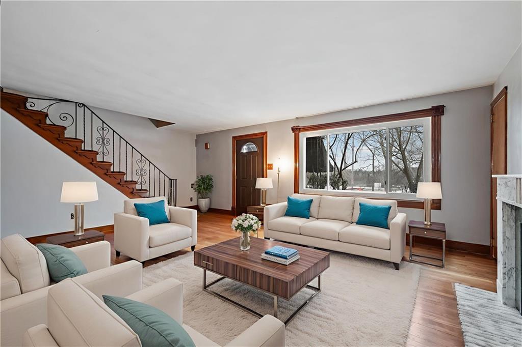 1327 Heberton Street Pittsburgh, PA 15206 - Photo 5 of 40 Virtually staged to show the large living room with picturesque window peering out into the park