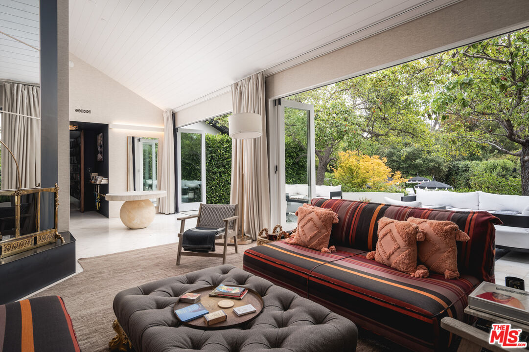 1381 East Valley Road Santa Barbara, CA 93108 - Photo 17 of 28 a living room with furniture and a large window