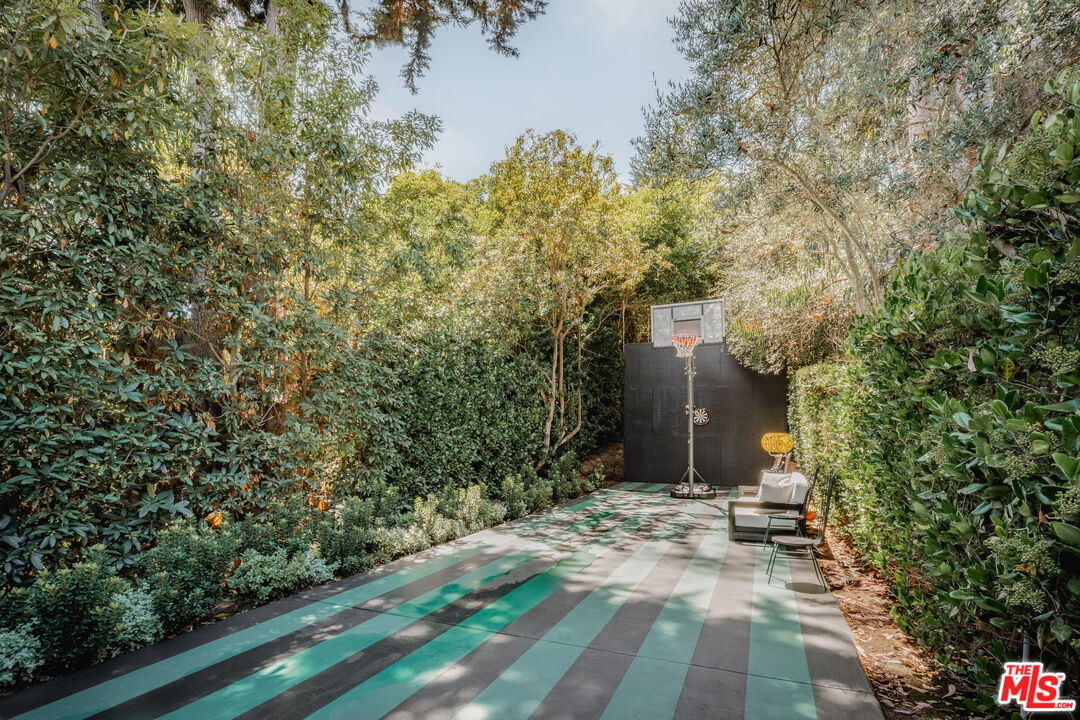 1381 East Valley Road Santa Barbara, CA 93108 - Photo 27 of 28 a view of a pathway both side of house next to a yard