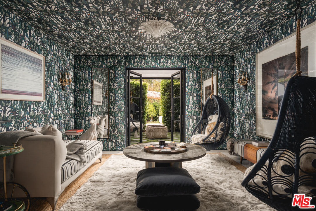 1381 East Valley Road Santa Barbara, CA 93108 - Photo 6 of 28 a view of a patio with couches chairs and a potted plant