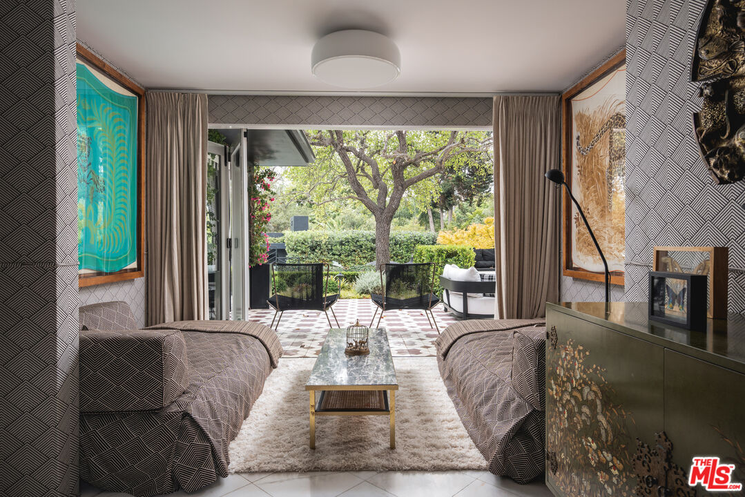 1381 East Valley Road Santa Barbara, CA 93108 - Photo 7 of 28 a living room with furniture and a large window