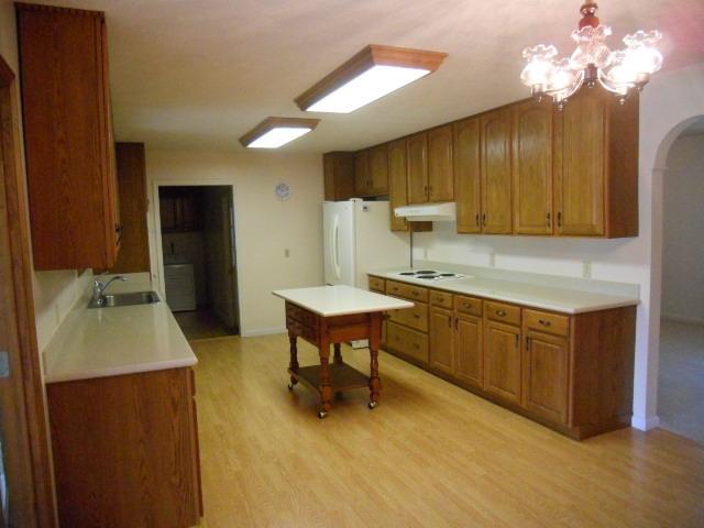 1130 Walnut Grove Road Dickson, TN 37055 - Photo 4 of 17 Upper kitchen has custom cabinet, corian countertops, ALL appliances stay.
