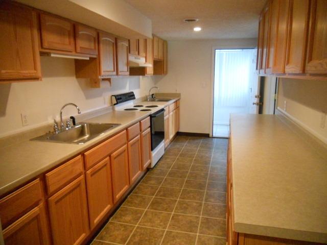 1130 Walnut Grove Road Dickson, TN 37055 - Photo 9 of 17 Lower level kitchen. Great for entertaining, canning or use it has the In-law kitchen.