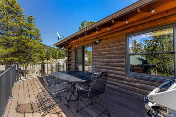 a balcony with wooden floor