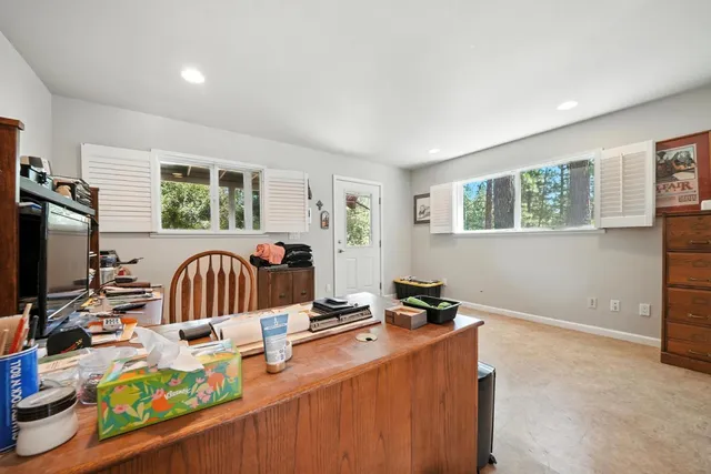 a backyard of a house with lots of green space