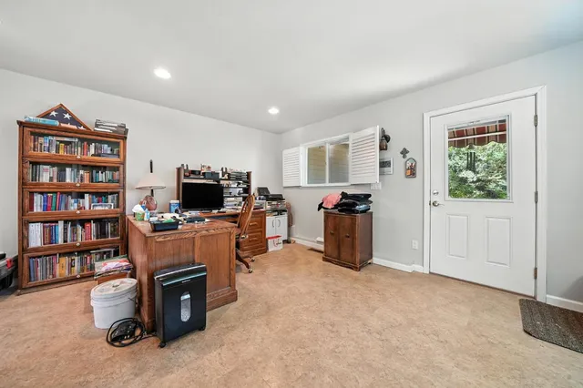 a backyard of a house with seating space