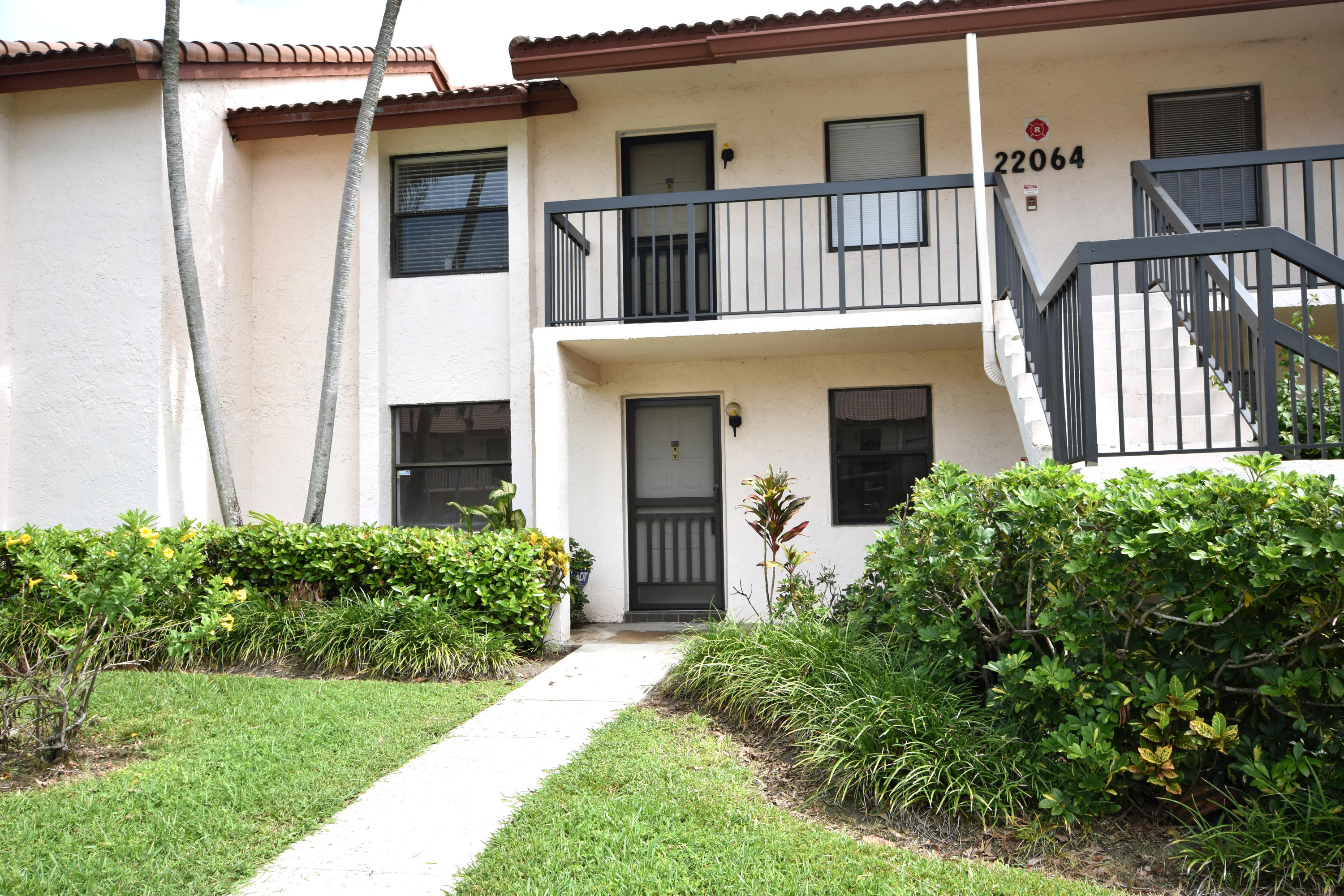 22064 Palms Way, Unit 103 Boca Raton, FL 33433 - Photo 1 of 16 Front 1