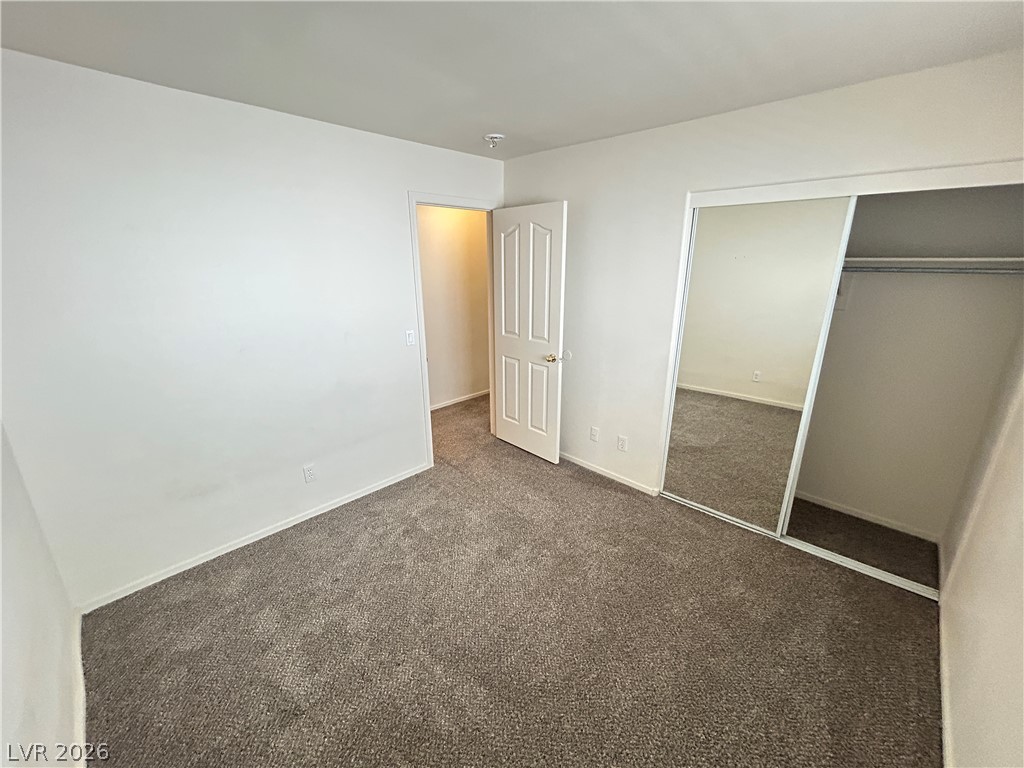 1840 Montvale Las Vegas, NV 89134 - Photo 20 of 31 An inviting sleeping space with ample floor area and convenient mirrored closet doors.
