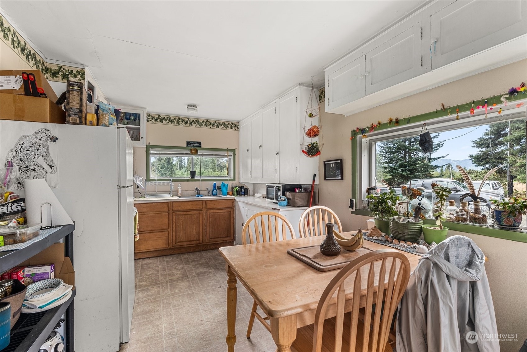 5402 Us Highway Humptulips, WA 98552 - Photo 11 of 17 a view of a dining room and furniture window and outside view