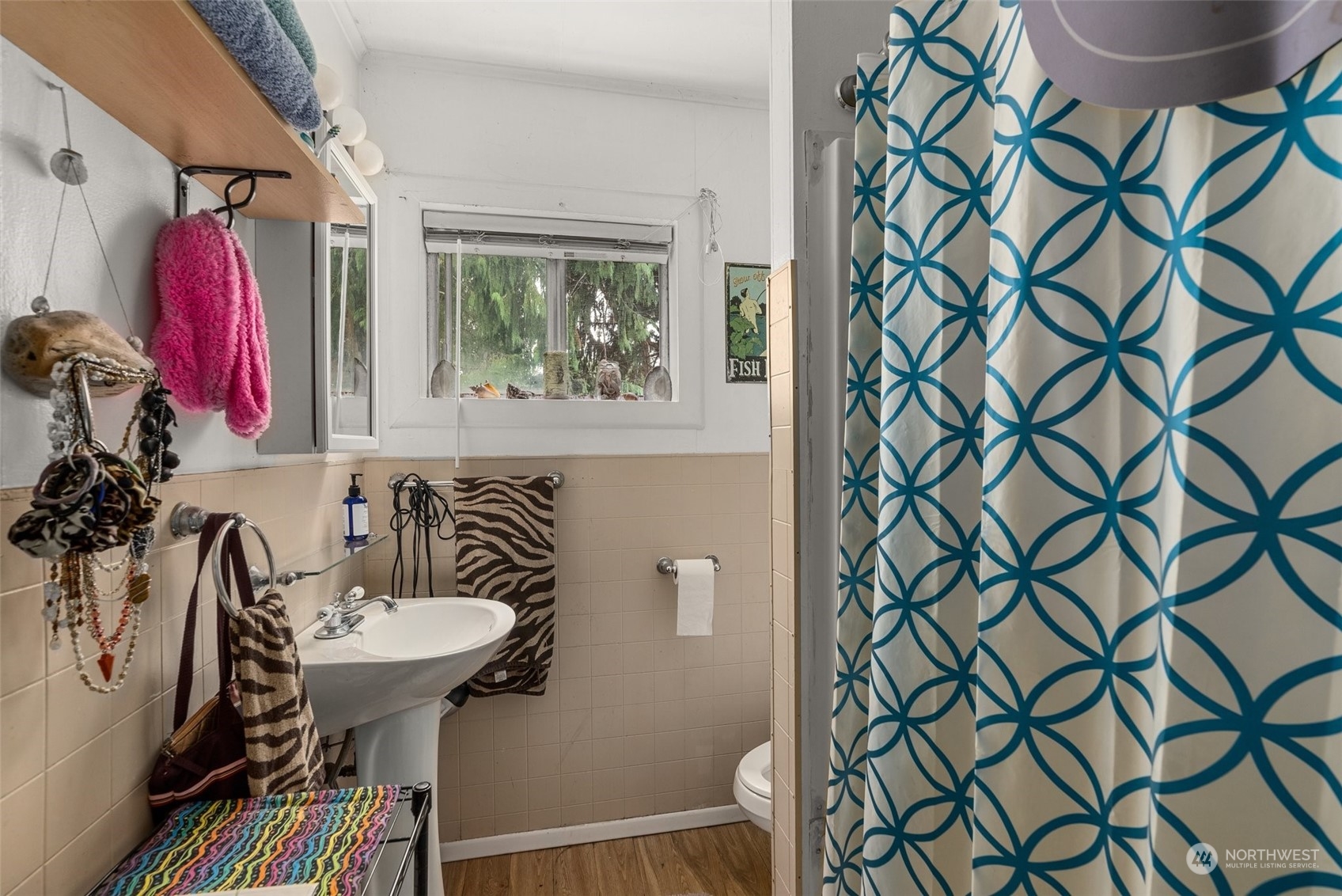 5402 Us Highway Humptulips, WA 98552 - Photo 15 of 17 a bathroom with a sink toilet and shower curtain