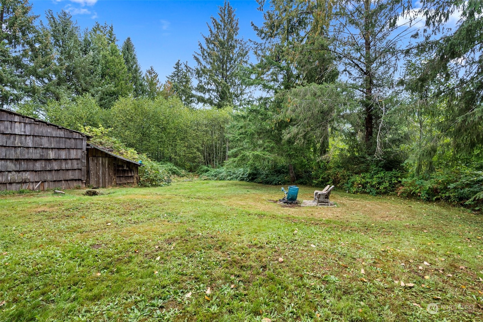 5402 Us Highway Humptulips, WA 98552 - Photo 4 of 17 a view of a backyard with green space