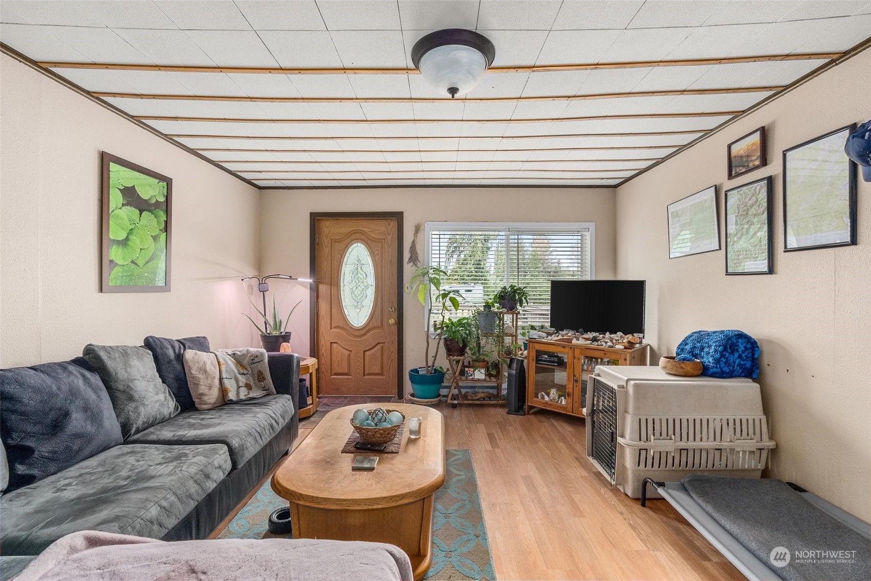 5402 Us Highway Humptulips, WA 98552 - Photo 8 of 17 a living room with furniture and a flat screen tv