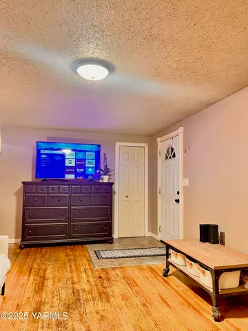 a view of a room with racks on the wall