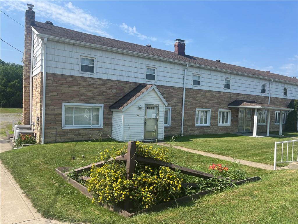 451-457 Joffre Cherry Valley Road Burgettstown, PA 15021 - Photo 2 of 46 a front view of a house with a yard