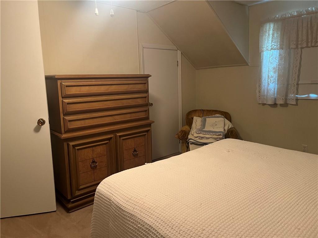 451-457 Joffre Cherry Valley Road Burgettstown, PA 15021 - Photo 30 of 46 a bedroom with a bed and dresser