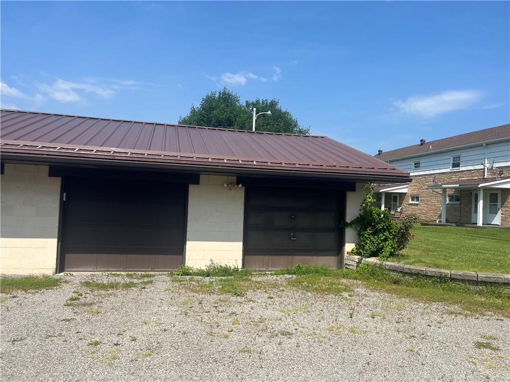 451-457 Joffre Cherry Valley Road Burgettstown, PA 15021 - Photo 37 of 46 a front view of a house with a yard