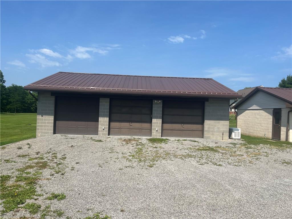 451-457 Joffre Cherry Valley Road Burgettstown, PA 15021 - Photo 39 of 46 a front view of a house with a yard
