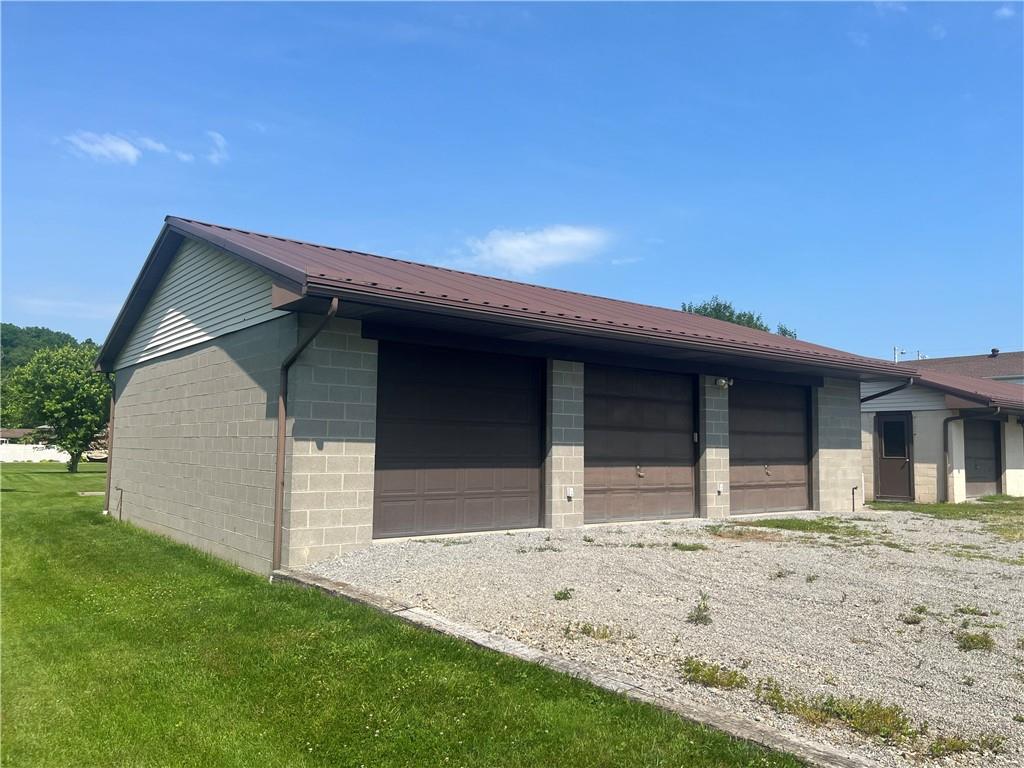 451-457 Joffre Cherry Valley Road Burgettstown, PA 15021 - Photo 40 of 46 a front view of a house with a yard