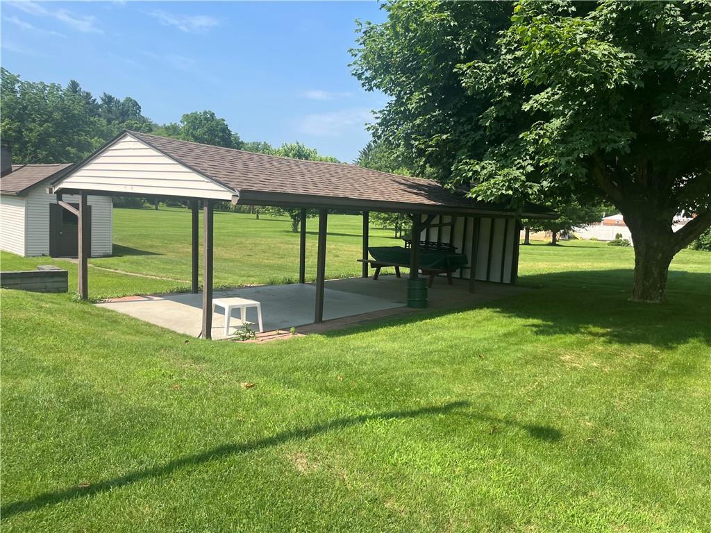 451-457 Joffre Cherry Valley Road Burgettstown, PA 15021 - Photo 6 of 46 a view of a house with backyard and a garden