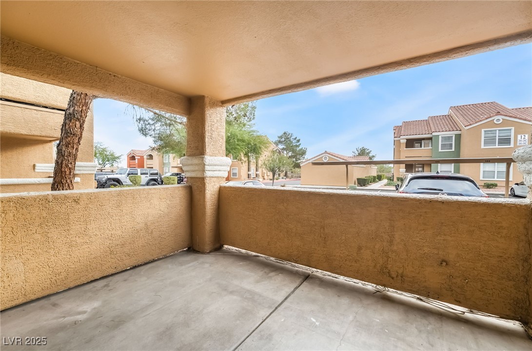8101 West Flamingo Road, Unit 1090 Las Vegas, NV 89147 - Photo 25 of 30 Balcony featuring a residential view