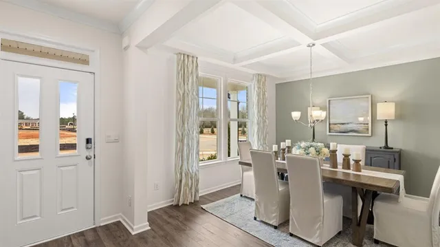 a open dining room with stainless steel appliances kitchen island granite countertop a stove a sink a dining table and chairs